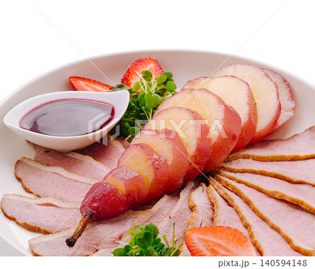 Sliced Roasted Duck Breast Served With Poached Pear 140594148