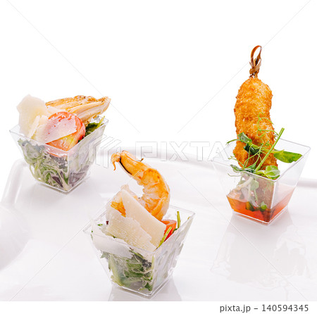 Three Assorted Catering Appetizers Inside Small Plastic Cups Three Assorted Catering Appetizers Inside Small Plastic Cups 140594345