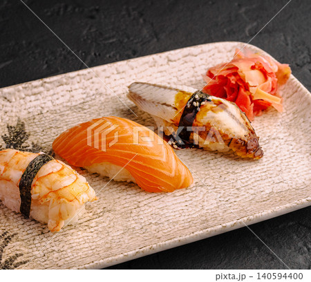 Three Traditional Japanese Nigiri Sushi On Ceramic Plate Three Traditional Japanese Nigiri Sushi On Ceramic Plate 140594400