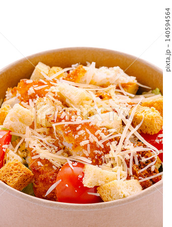 Fresh salad with croutons and cheese served in a brown bowl Fresh salad with croutons and cheese served in a brown bowl 140594564