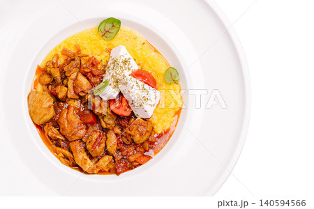 Traditional Moldovan Mamaliga With Meat Stew And Cheese Traditional Moldovan Mamaliga With Meat Stew And Cheese 140594566