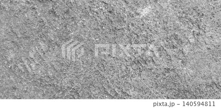 Close up of grey concrete surface texture with natural rough pattern and visible grain details. Close up of grey concrete surface texture with natural rough pattern and visible grain details. 140594811