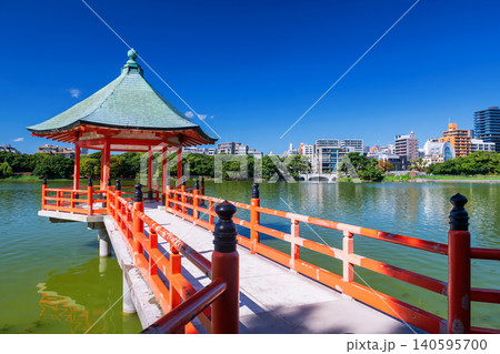 Iconic hexagonal red pavilion landmark from Ohori lake park, Fukuoka Iconic hexagonal red pavilion landmark from Ohori lake park, Fukuoka 140595700