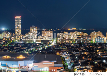 modern residential towers and houses by Hakata bay at night, Fukuoka 140595720