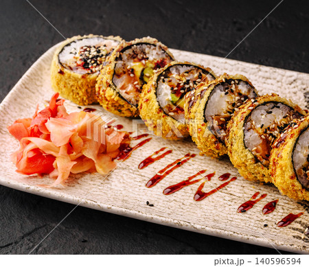 Tempura fried sushi rolls with ginger and eel sauce Tempura fried sushi rolls with ginger and eel sauce 140596594