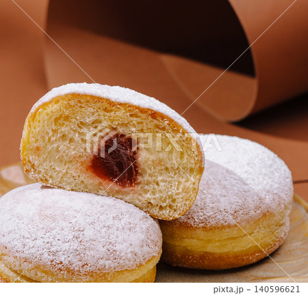 Berliner donuts with jam filling and powdered sugar Berliner donuts with jam filling and powdered sugar 140596621
