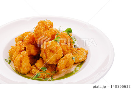 Plate of crispy breaded deep-fried popcorn shrimp Plate of crispy breaded deep-fried popcorn shrimp 140596632