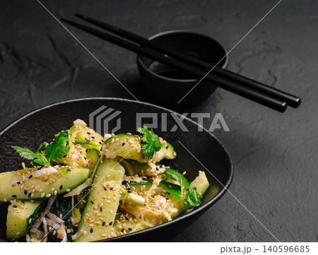 Asian cucumber salad with sesame seeds and cilantro 140596685