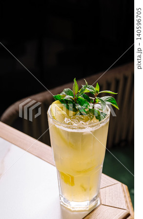 Refreshing lime and mint cocktail with ice cubes Refreshing lime and mint cocktail with ice cubes 140596705