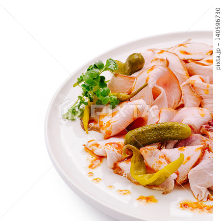 Sliced meat cold cuts platter with pickles and chili peppers Sliced meat cold cuts platter with pickles and chili peppers 140596730