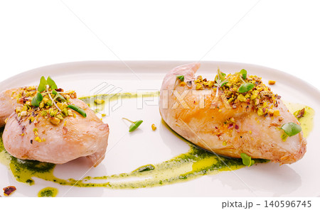 Chicken breast with pistachio crust and green sauce Chicken breast with pistachio crust and green sauce 140596745