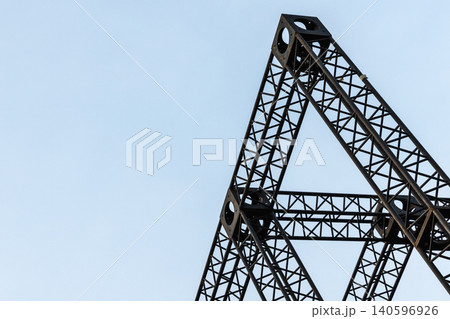 Black steel truss framework forming triangular lattice shape Black steel truss framework forming triangular lattice shape 140596926