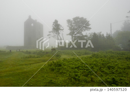 tmospheric misty moorland view with Cornish engine house. tmospheric misty moorland view with Cornish engine house. 140597520