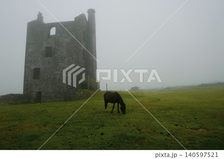 tmospheric misty moorland view with Cornish engine house. tmospheric misty moorland view with Cornish engine house. 140597521