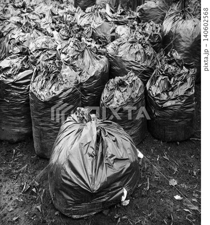 Many garbage bags in the park Many garbage bags in the park 140602568