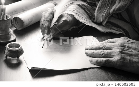 Male hand witn big quill 140602603