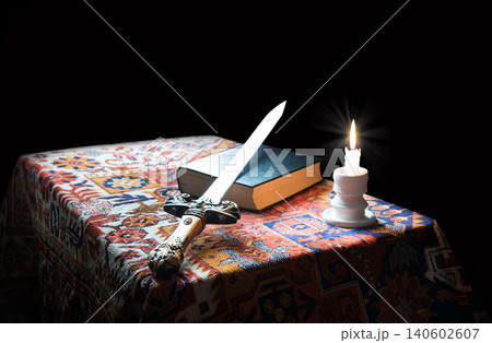 Iron sword on old bible 140602607
