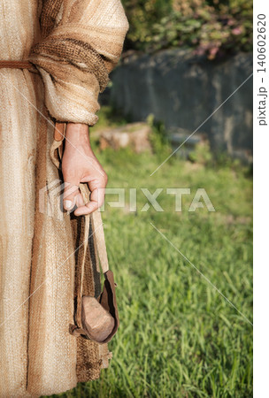 Ancient man with a sling Ancient man with a sling 140602620