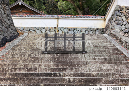 The Japanese style movable wooden fence forbids from approaching the stair in the sacred place. 140603141