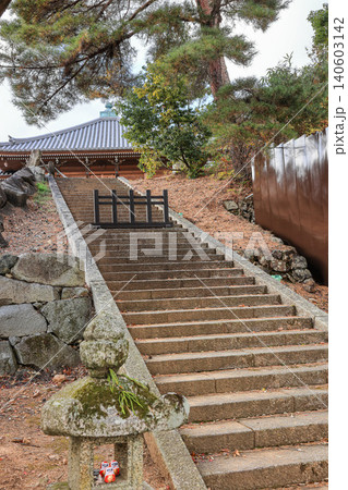 The Japanese style movable wooden fence forbids from approaching the stair in the sacred place. The Japanese style movable wooden fence forbids from approaching the stair in the sacred place. 140603142