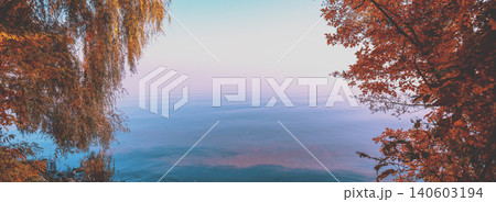 Beautiful sea coast with trees in autumn Beautiful sea coast with trees in autumn 140603194
