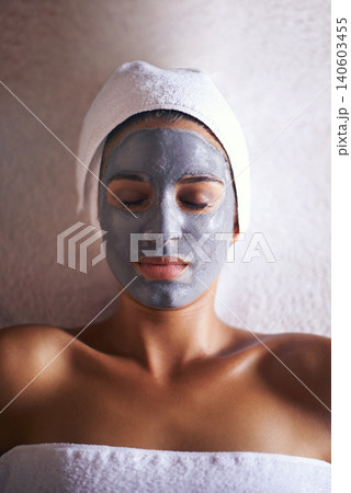 Woman, top view with face mask and beauty with skincare, charcoal for treatment and dermatology at day spa. Peace, calm and detox for skin, healthy with wellness and cosmetics for facial ad self care Woman, top view with face mask and beauty with skincare, charcoal for treatment and dermatology at day spa. Peace, calm and detox for skin, healthy with wellness and cosmetics for facial ad self care 140603455