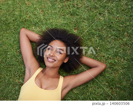 Happy, grass and above of black woman in park for thinking, wondering and relax in nature. Smile, garden and top view of person laying outdoors for holiday, vacation and weekend for calm or peace Happy, grass and above of black woman in park for thinking, wondering and relax in nature. Smile, garden and top view of person laying outdoors for holiday, vacation and weekend for calm or peace 140603506