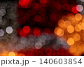 Dark tricolor bokeh red silver orange night background Dark tricolor bokeh red silver orange night background 140603854