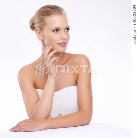 Thinking, woman and bride with makeup in studio on white background in confidence for beauty. Female person, classy and glamour in bridal dress design for love, anniversary and celebrations. Thinking, woman and bride with makeup in studio on white background in confidence for beauty. Female person, classy and glamour in bridal dress design for love, anniversary and celebrations. 140603894