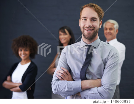 Business man, leadership and arms crossed in studio portrait for teamwork, confidence and about us on a wall background. Professional man, group and accountant with smile for company, job or career Business man, leadership and arms crossed in studio portrait for teamwork, confidence and about us on a wall background. Professional man, group and accountant with smile for company, job or career 140603955