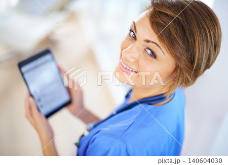 Healthcare, tablet and portrait of nurse woman in scrubs at hospital for research or info from above. Medical, technology and smile on face of happy young medicine professional in clinic for results 140604030