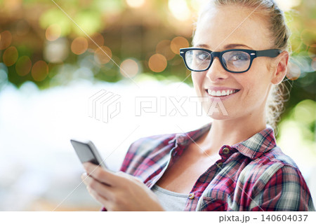 Woman, portrait and internet with phone outdoor for communication, social media and mobile chat with smile. Person, face and happy with smartphone for text message, online scroll and email with bokeh 140604037