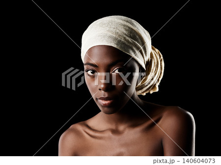 Beauty, portrait and black woman with head wrap, natural makeup or creative aesthetic in studio mockup. Art, skincare and African girl on dark background with scarf, facial cosmetics and confidence. 140604073