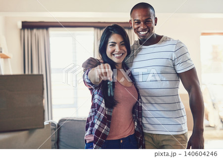 House keys, portrait or happy couple in dream home for property, investment or moving in success. Real estate, mortgage or people hug in apartment building with love, support or ownership milestone House keys, portrait or happy couple in dream home for property, investment or moving in success. Real estate, mortgage or people hug in apartment building with love, support or ownership milestone 140604246