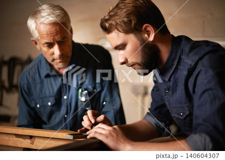 Man, dad and coach with wood, workshop and family business or apprenticeship. Father, adult son and design with artisan, carpentry and together for startup or mentor with learning and working Man, dad and coach with wood, workshop and family business or apprenticeship. Father, adult son and design with artisan, carpentry and together for startup or mentor with learning and working 140604307