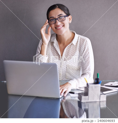 Businesswomen, smile and portrait at office, desk and laptop for corporate worker. Technology, computer or glasses for female financial advisor, happy and accounting working online for finance Businesswomen, smile and portrait at office, desk and laptop for corporate worker. Technology, computer or glasses for female financial advisor, happy and accounting working online for finance 140604693