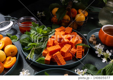 Apricot pastila fruit snacks with fresh mint and tea 140605077
