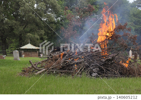 Brush Pile at Loftin Cemetery on Fire, Cleanup of Historical Cemetery Rural TX 140605212
