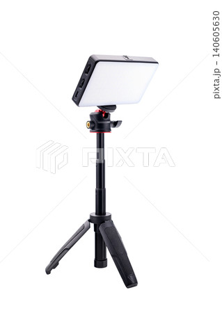 video lamp on a tripod tilted upwards video lamp on a tripod tilted upwards 140605630