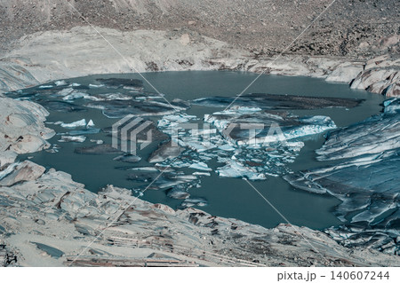 Lake of melted ice in mountain glacier Lake of melted ice in mountain glacier 140607244