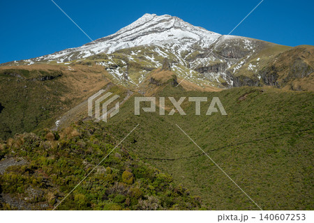 Scenery view of Mt.Taranaki in Egmont national park, New Zealand. Mt.Taranaki (2518 metres) summit of this dormant volcano offers truly amazing views. Scenery view of Mt.Taranaki in Egmont national park, New Zealand. Mt.Taranaki (2518 metres) summit of this dormant volcano offers truly amazing views. 140607253