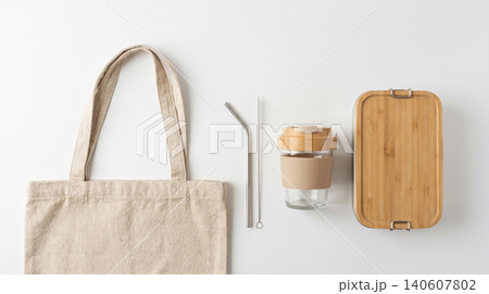 Sustainable lunch and travel accessory set with cotton bag and bamboo container plastic free sustainable reusable lifestyle environment accessories conscious minimalist biodegradable 140607802