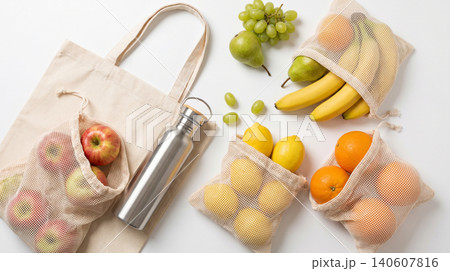 Reusable mesh grocery bags with fresh fruits vegetables and reusable stainless steel water bottle reusable sustainable stainless friendly shopping environment composition background lifestyle Reusable mesh grocery bags with fresh fruits vegetables and reusable stainless steel water bottle reusable sustainable stainless friendly shopping environment composition background lifestyle 140607816