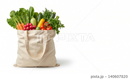 Reusable canvas tote bag filled with fresh organic vegetables plant based shopping bag grocery bag vegetables shopping reusable agriculture environment sustainable background nutritious Reusable canvas tote bag filled with fresh organic vegetables plant based shopping bag grocery bag vegetables shopping reusable agriculture environment sustainable background nutritious 140607820