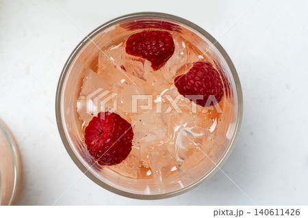 Raspberry sparkling drink ice top view Raspberry sparkling drink ice top view 140611426