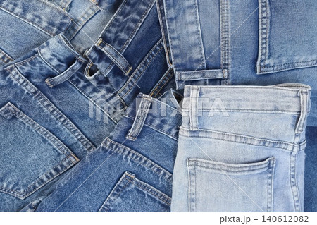 Assorted denim jeans in different colors and styles Assorted denim jeans in different colors and styles 140612082
