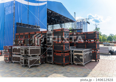 Stage setup with scaffolding and flight cases Stage setup with scaffolding and flight cases 140612928