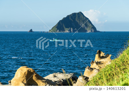 Looking out over Keelung Islet from the coastal geological landscape of Heping Island GeoPark in Keelung, Taiwan. Looking out over Keelung Islet from the coastal geological landscape of Heping Island GeoPark in Keelung, Taiwan. 140613201
