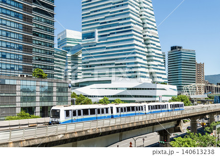 A train on the Wenhu or Brown Line of the Taipei MRT passes by the modern metropolis building in Nangang Software Park Area. 140613238