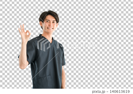 Young Asian male doctor, nurse, caregiver, and emergency physician wearing scrubs Young Asian male doctor, nurse, caregiver, and emergency physician wearing scrubs 140613619